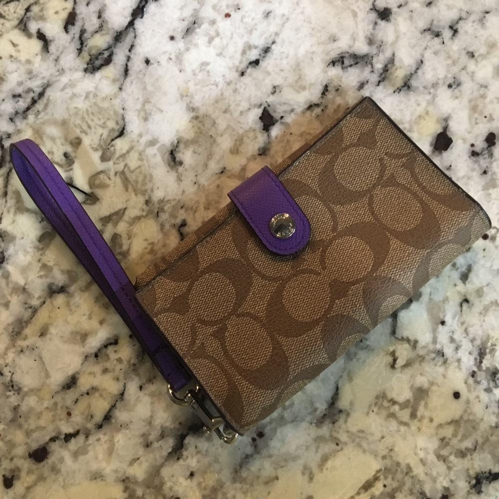 Coach tan and purple wristlet